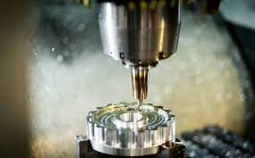 A product development team compares CNC-machined, metal 3D-printed, and vacuum-cast metal prototypes on a workbench, with a decision framework flowchart on a laptop, visualizing the strategic choice in prototyping methods.